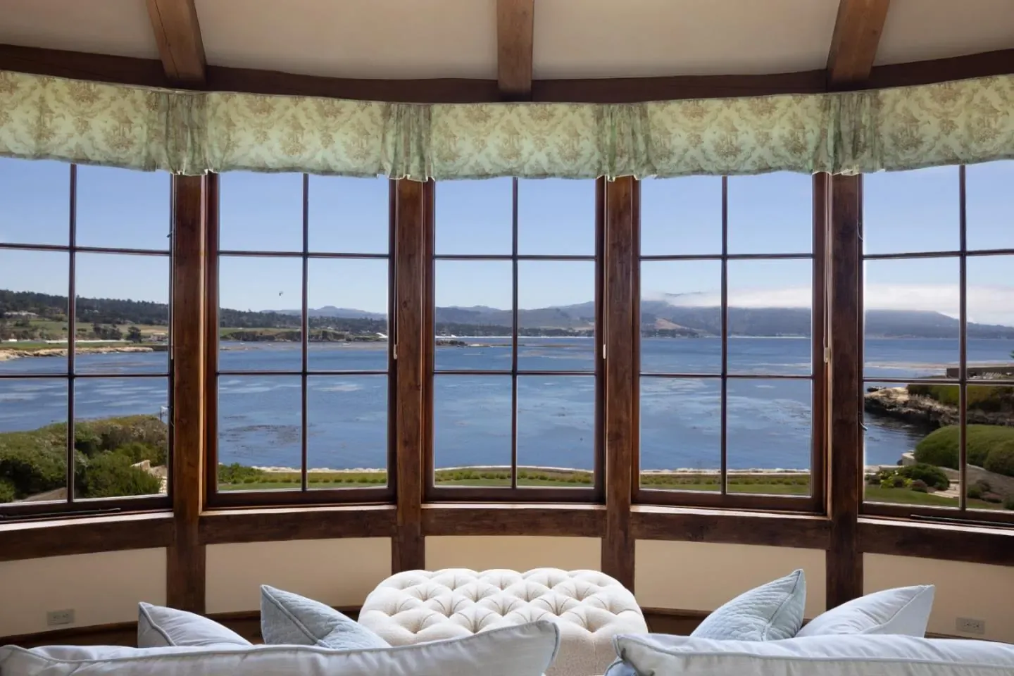 Primary suite bay with views toward the 18th fairway at Gem Cove, Pebble Beach, California