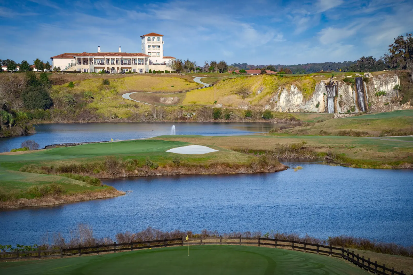 The Club at Iron Lake clubhouse overlooking quarry lake in Ocala, Florida