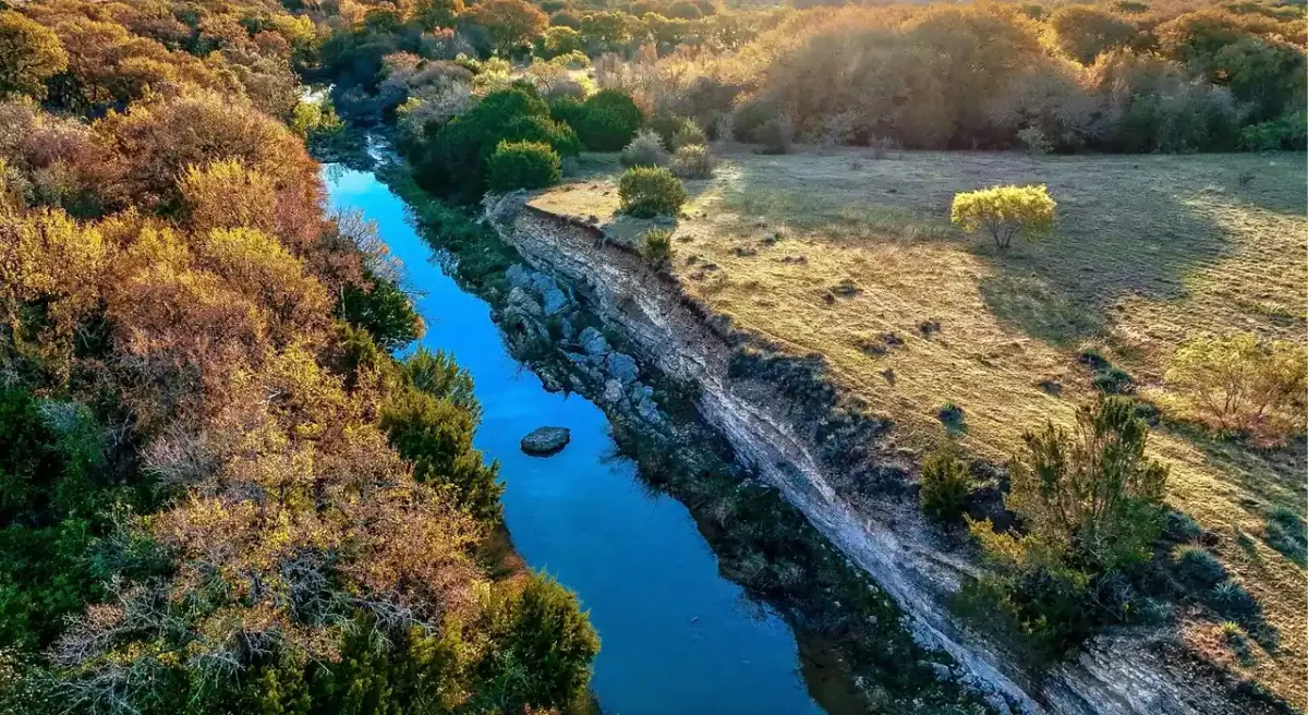 Creek and limestone bluffs at Bluejack Ranch in Aledo, Texas, near Fort Worth