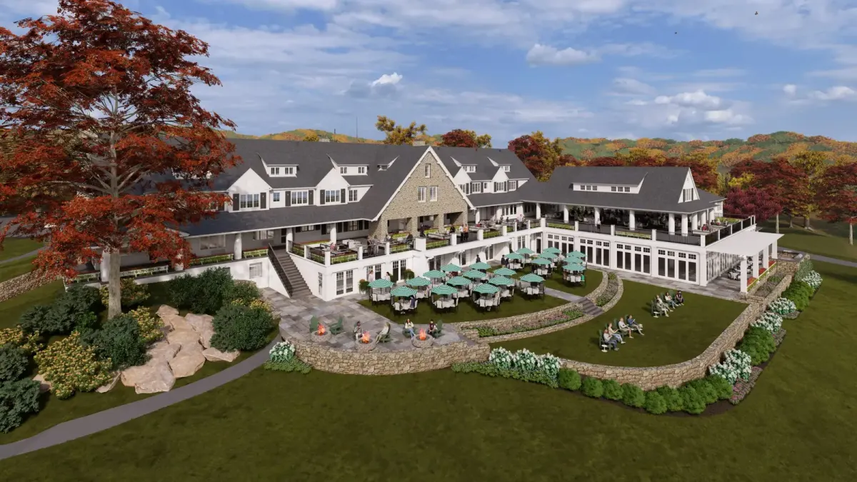 Rendering of the renovated Bald Peak Colony Club clubhouse in New Hampshire above a stone-walled lower patio with fire pits and striped umbrellas