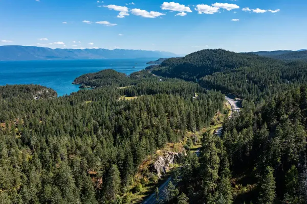 Forested hills above Flathead Lake near Lakeside, Montana, the landscape around Territory 1889