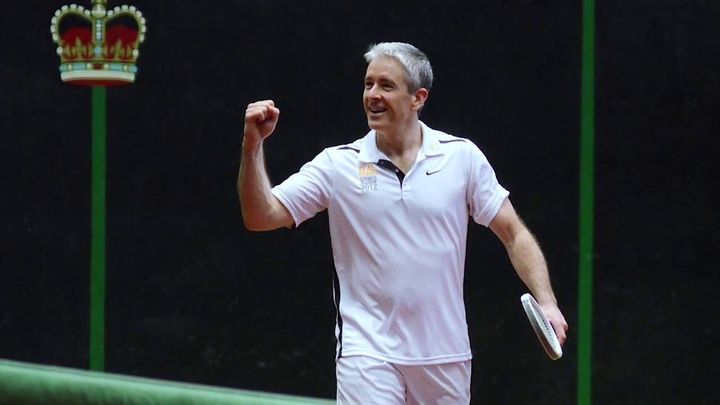 rob fahey holding up his fist in celebration