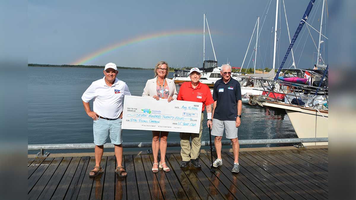Photo: Yacht Club donates to Vital Visions campaign