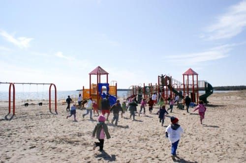 Volunteers swarm Prov Bay beach, leave playground in wake
