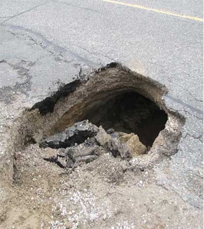 West Enders furious with road conditions