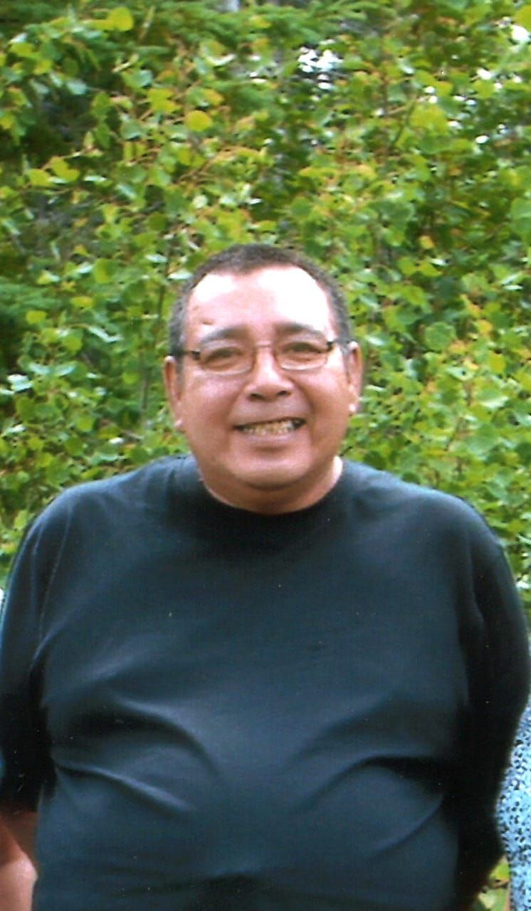 CLARENCE A. ASSINEWAI