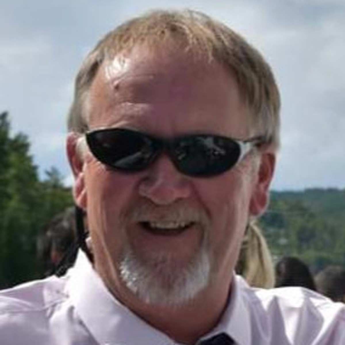 TIMOTHY E. MOORE