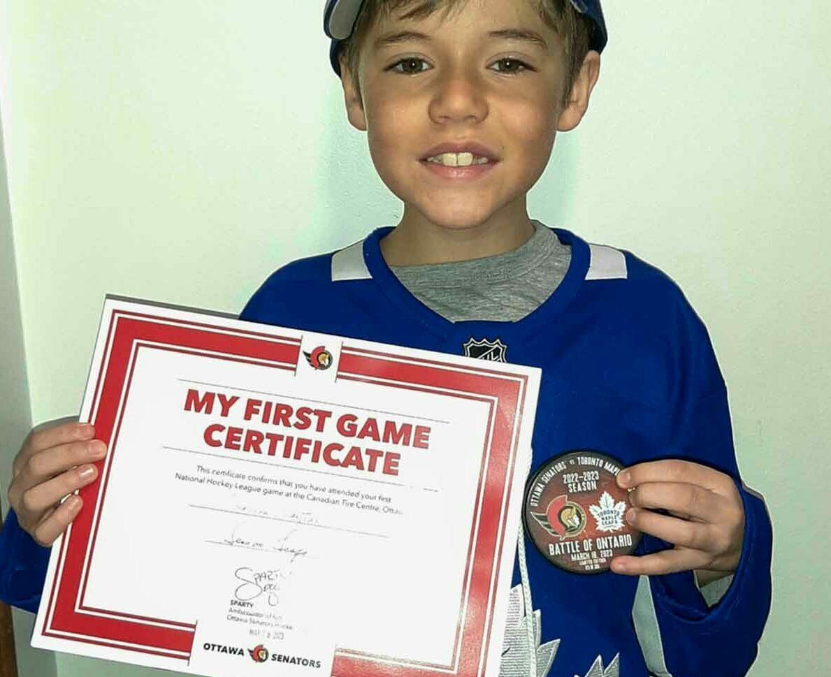 Young Maple Leafs fan attends first NHL game