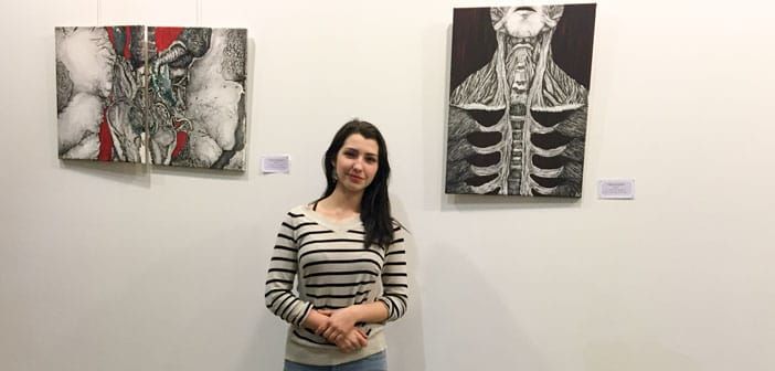 Metis artist displays work during annual Debajmujig Seed Swap