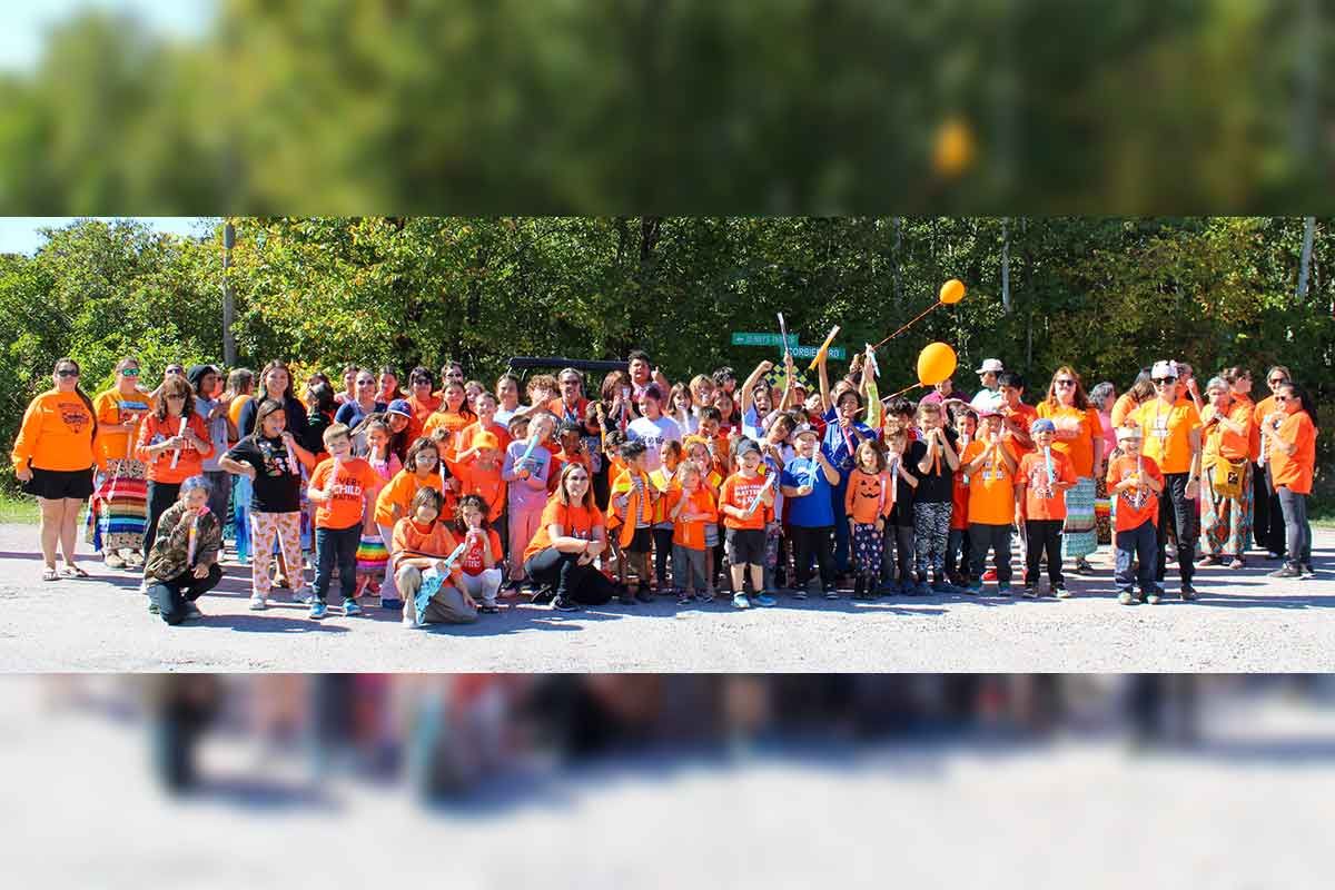 Lakeview School walks for those who made it home, and for those who did not