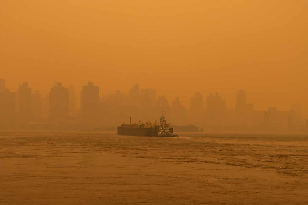 Bonnie Kogos inhales Canadian smoke in New York City