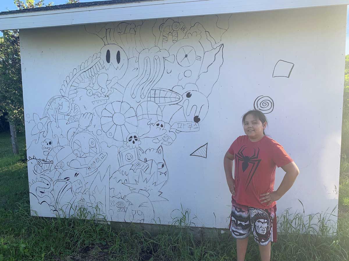 Wiikwemkoong student creates monochrome mural