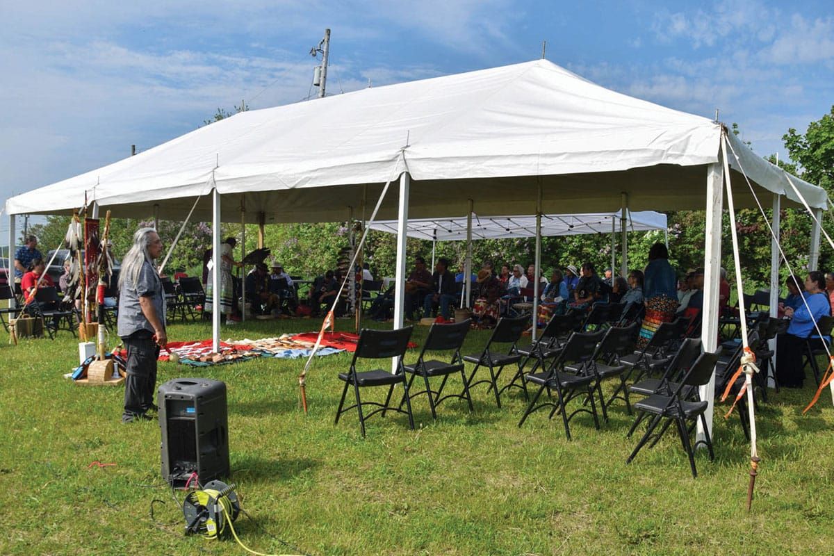 Pipe carriers and elders gather above Manitowaning Bay to honour pipes