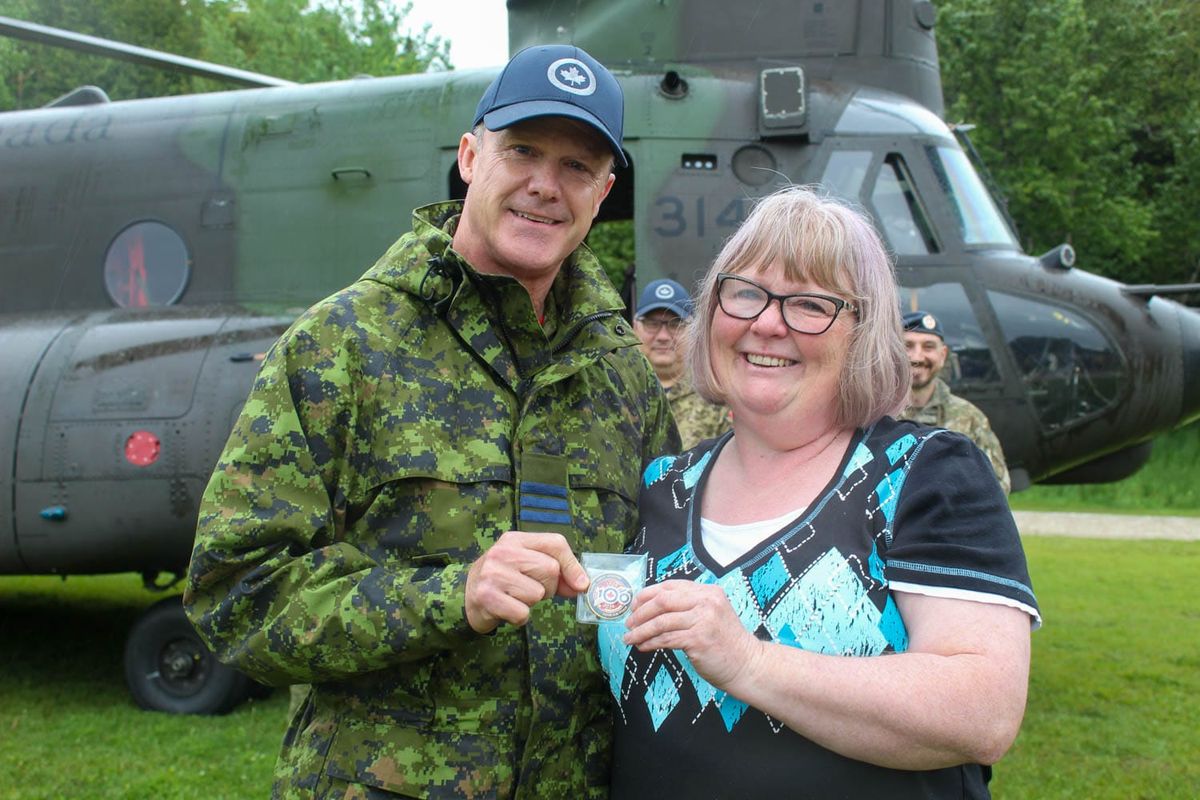 Chinook helicopter makes surprise Friday landing at Gore Bay schoolyard, teacher honoured for military support
