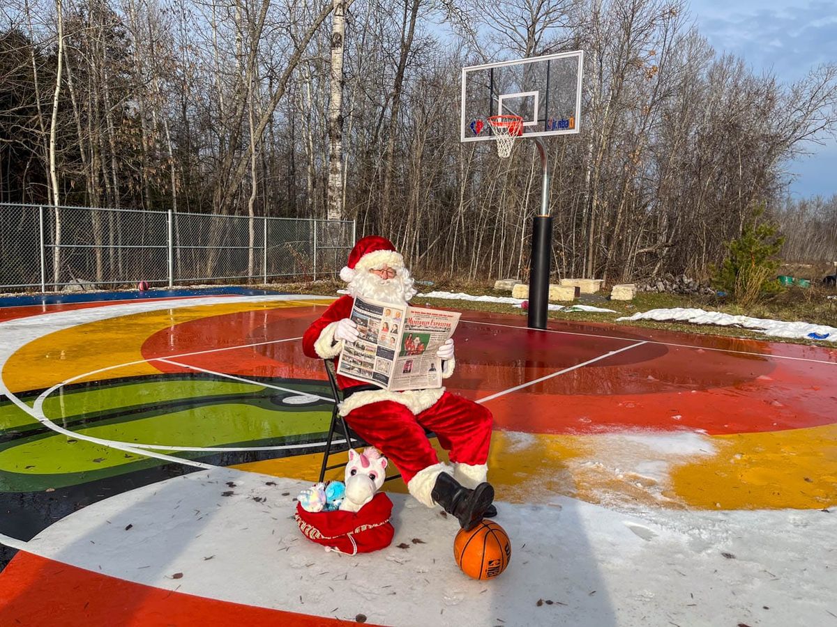 SANTA STOPS IN SHEG