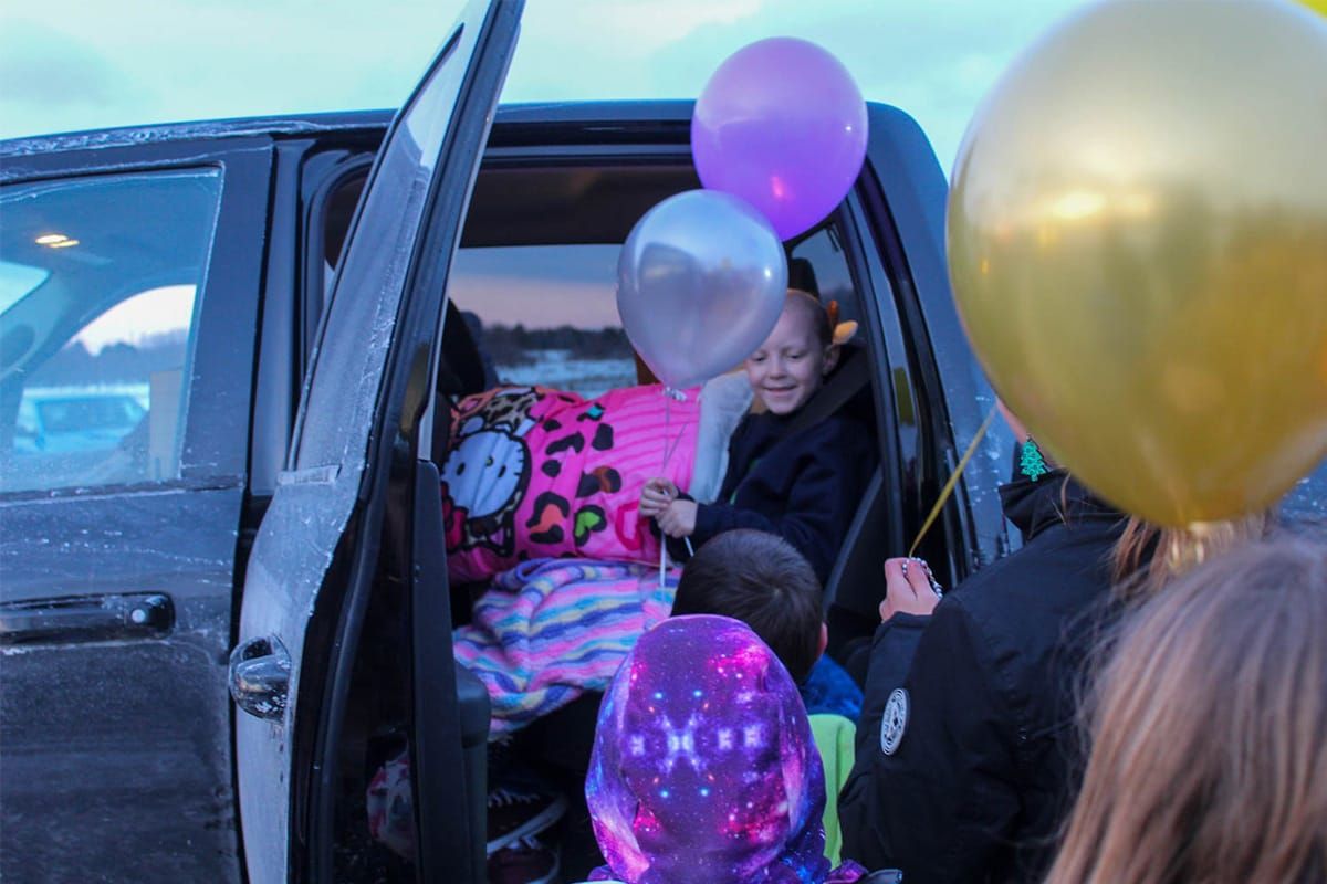 Island girl battling leukemia gets warm welcome home from West End community