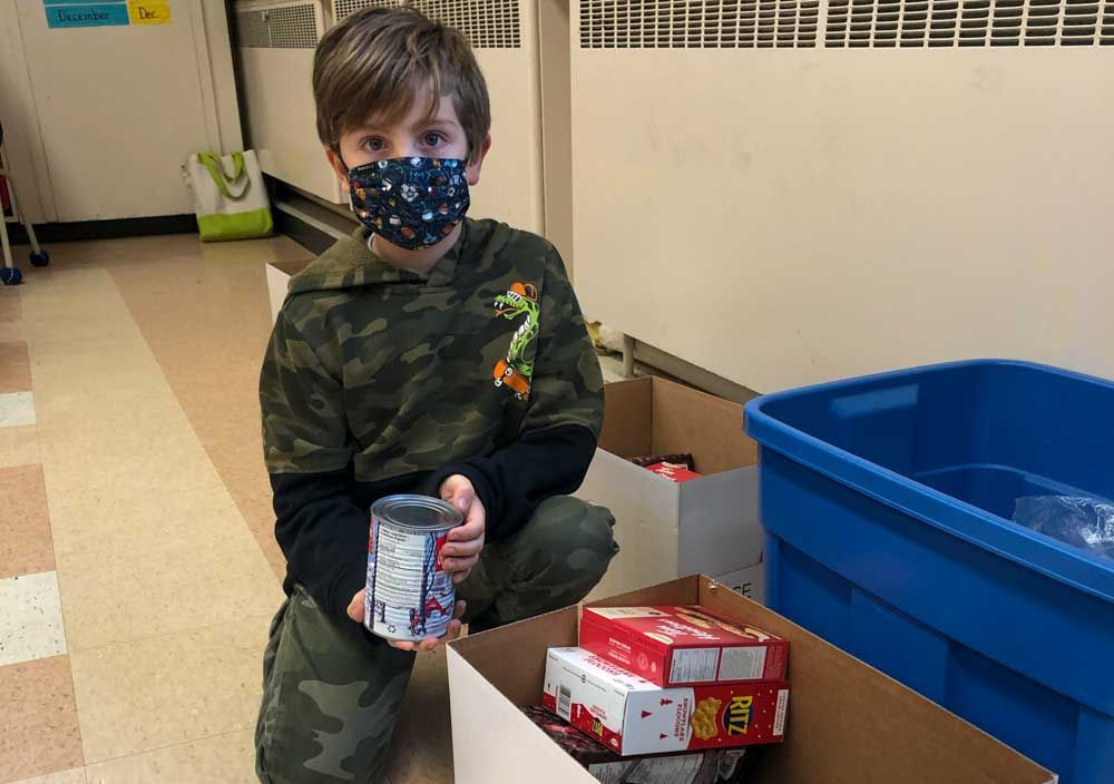 Island elementary school students join forces to bring Christmas cheer to troops
