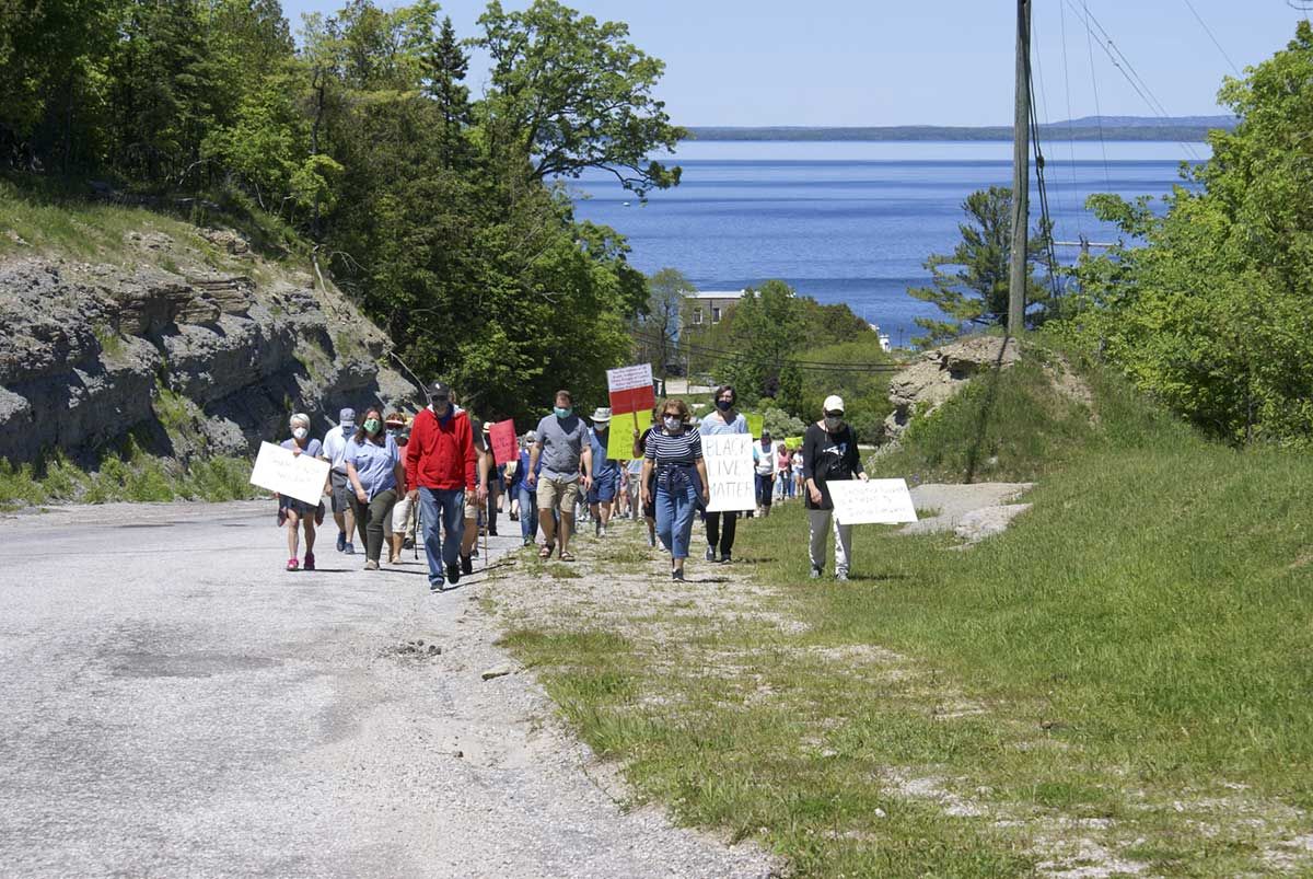 Islanders show solidarity in peaceful walk to fight for social justice