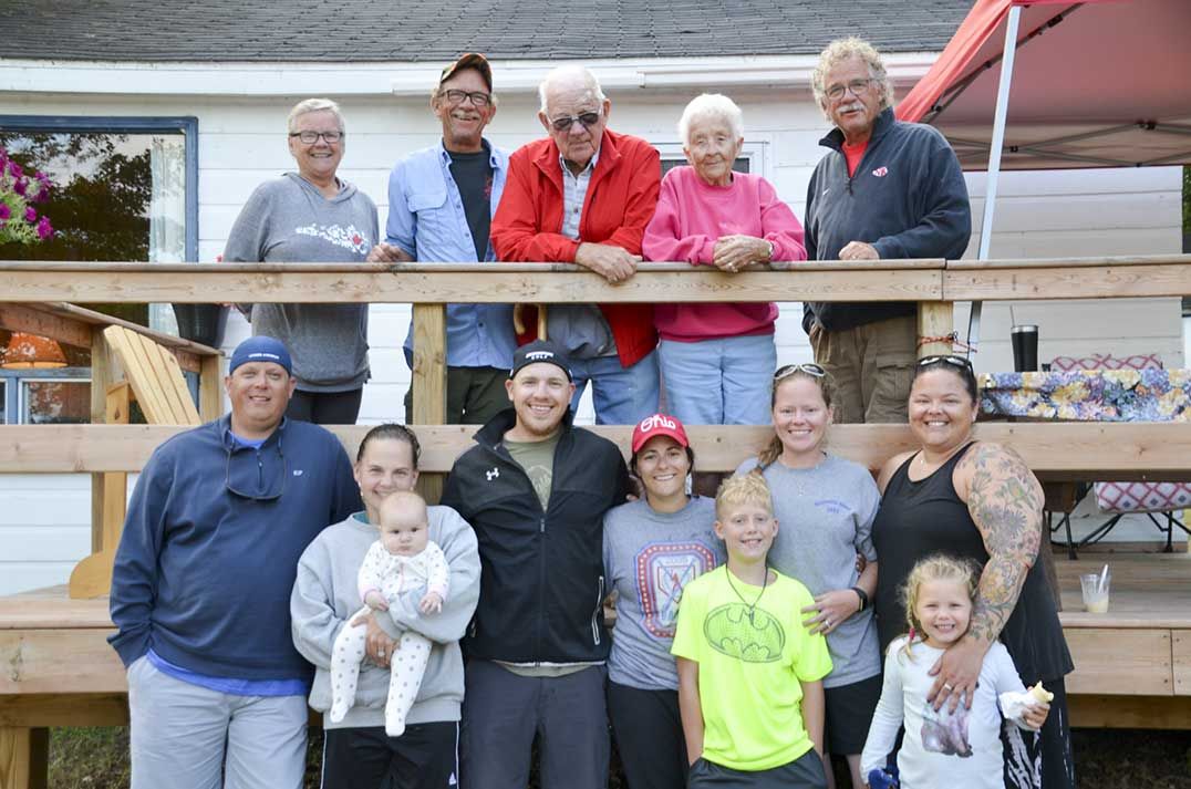 Three generations of resort owners greet three generations of clients