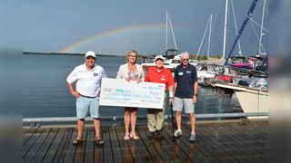 Photo: Yacht Club donates to Vital Visions campaign