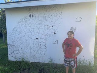 Wiikwemkoong student creates monochrome mural