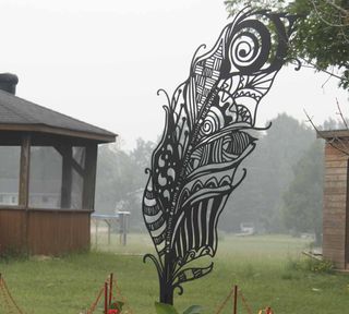This beautiful monument, in the shape of a feather, was unveiled in the community of Zhiibaahaasing 91���˵��� last week. T