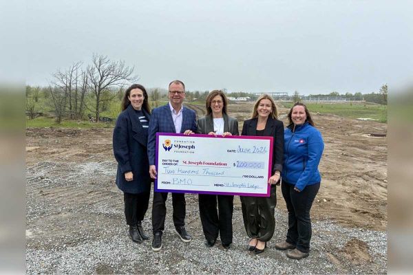 BMO’s $200,000 gift helps  build new St. Joseph’s Lodge  and supports the Angel Bus