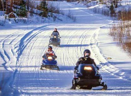 Snowmobile trails groomed, ready