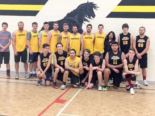 Alumni volleyball game sees vets take it
