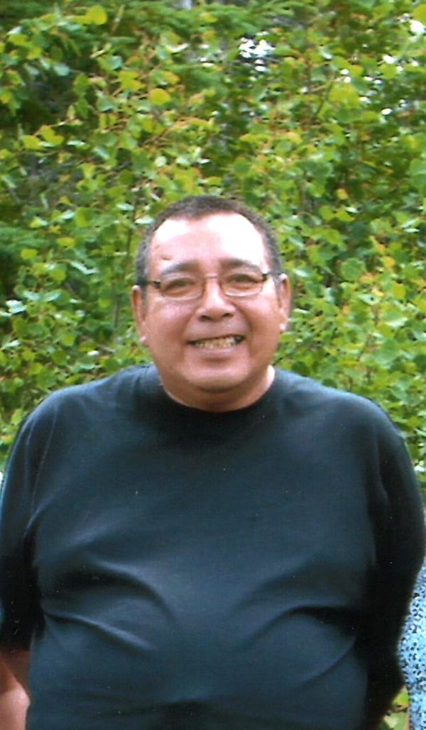 CLARENCE A. ASSINEWAI