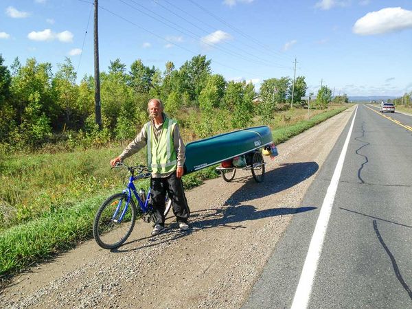 Bike peddler explores Canada with a bicycle-canoe combination, destination London, Ontario