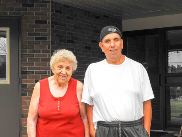 Island expat Eddy Howard nestles in a L’Arche Sudbury Christmas
