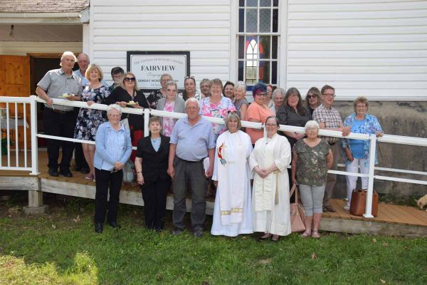 June McDougall, centre left in robes (who also officiates at Knox United Church in Manitowaning and St. Andrews by the Sea in