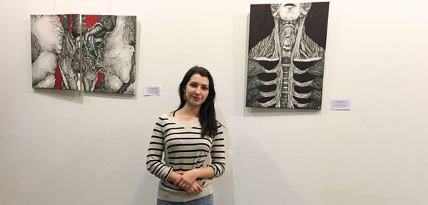 Metis artist displays work during annual Debajmujig Seed Swap