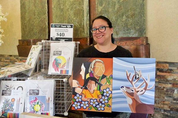 Artist Angela Jason, of Sheshegwaning First Nation who now lives in Thunder Bay, displays two of her digital art designs at T