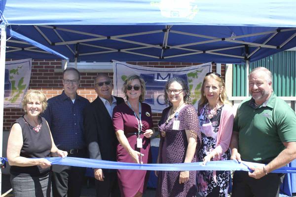 Cutting the ribbon! From left, Carol Hughes, MPP for Algoma-Manitoulin-Kapuskasing, Jeff Smith of the Douglas A. Smith Family