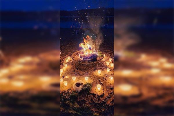 A candlelight vigil brings community together in grief and hope for the return of Juanita Migwans