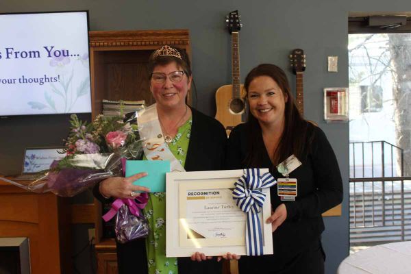 Happy retirement Laurie! From left, Laurie Turley, was presented with a recognition of service award by Jaime-Lynn Kalmikov,