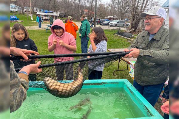Wiikwemkoong students learn conservation with the Little Current Fish and Game Club crew