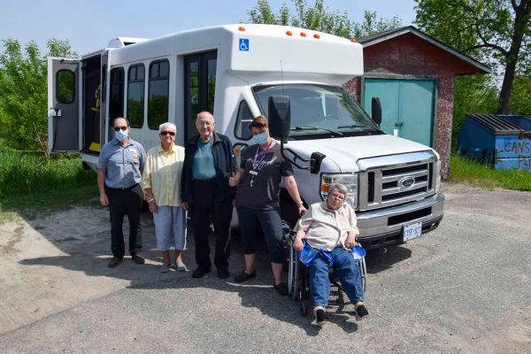 Manor administrator Don Cook, left, is joined by residents Jean Pearson, Bill Trainor, activities coordinator Julie Omnet and