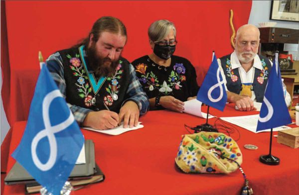 Mitch Case, Metis Nation of Ontario Regional Councillor of the Huron Superior Regional Metis Community, left in photo, says c