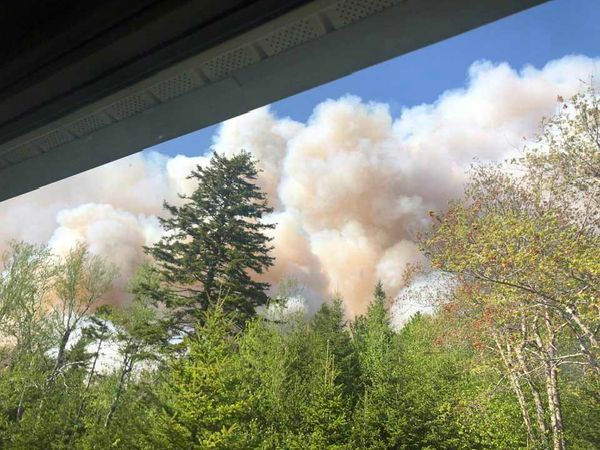 Before the evacuation order, Laurie Landry captured thick smoke from the wildfires headed their way.