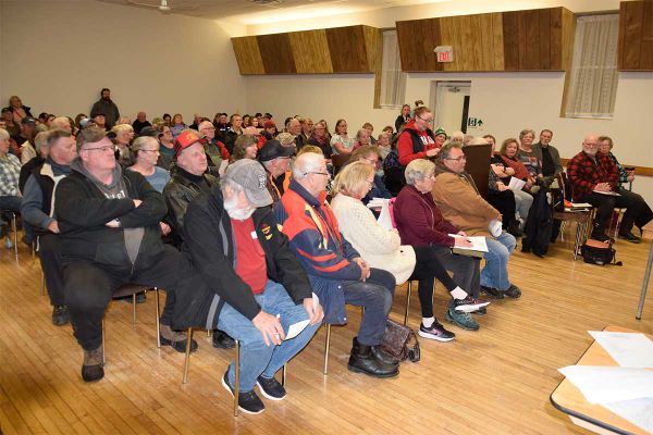Packed Providence Bay Hall challenges closure decisions