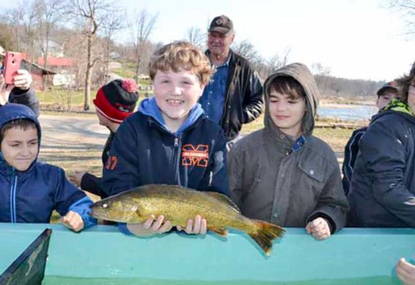 Jordan Goddard, holds up a walleye during his Little Current Public School’s class trip to the Little Current Fish and Game’s