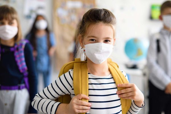 Public Health reporting practices for confirmed cases and outbreaks of COVID-19 in school settings