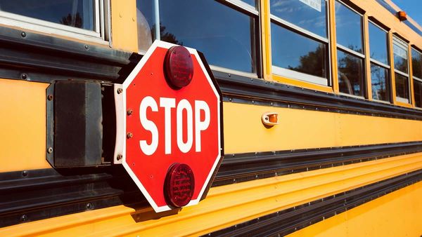 School bus amber-red light warning systems mandated