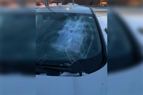 Island priest narrowly escapes injury from ice off of passing vehicle