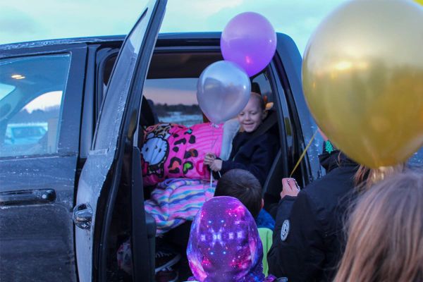 Island girl battling leukemia gets warm welcome home from West End community