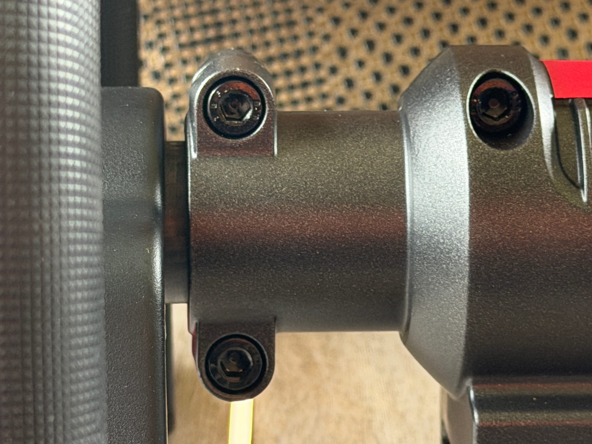Hex screws securing the shaft connection joint on the MOVA brushless string trimmer