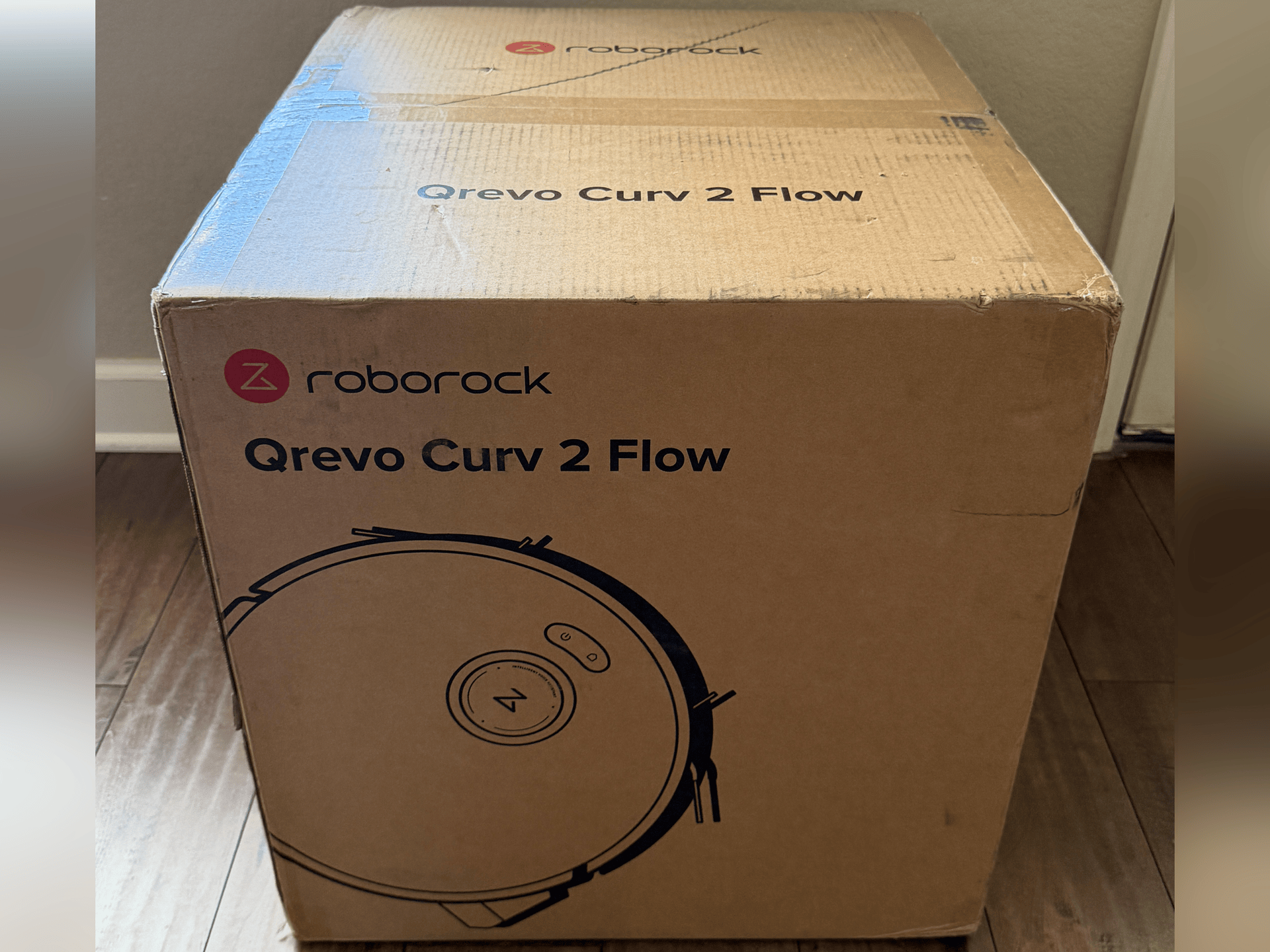 Unboxing the Roborock Qrevo Curv 2 Flow showing included accessories